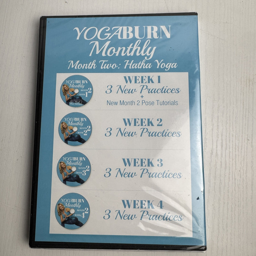 Set of four factory-sealed Yoga Burn Monthly and NOOMA Breathe home fitness DVDs