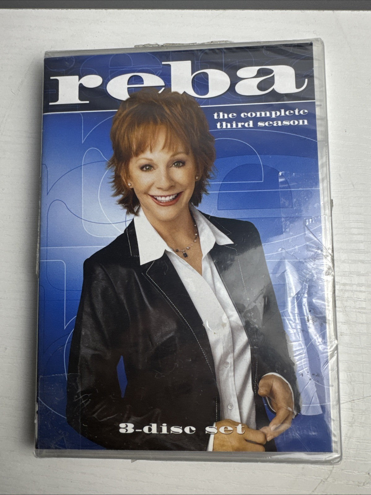 Lot of 4 factory-sealed TV series DVD sets featuring Pretty Little Liars, Reba, and Simon & Simon
