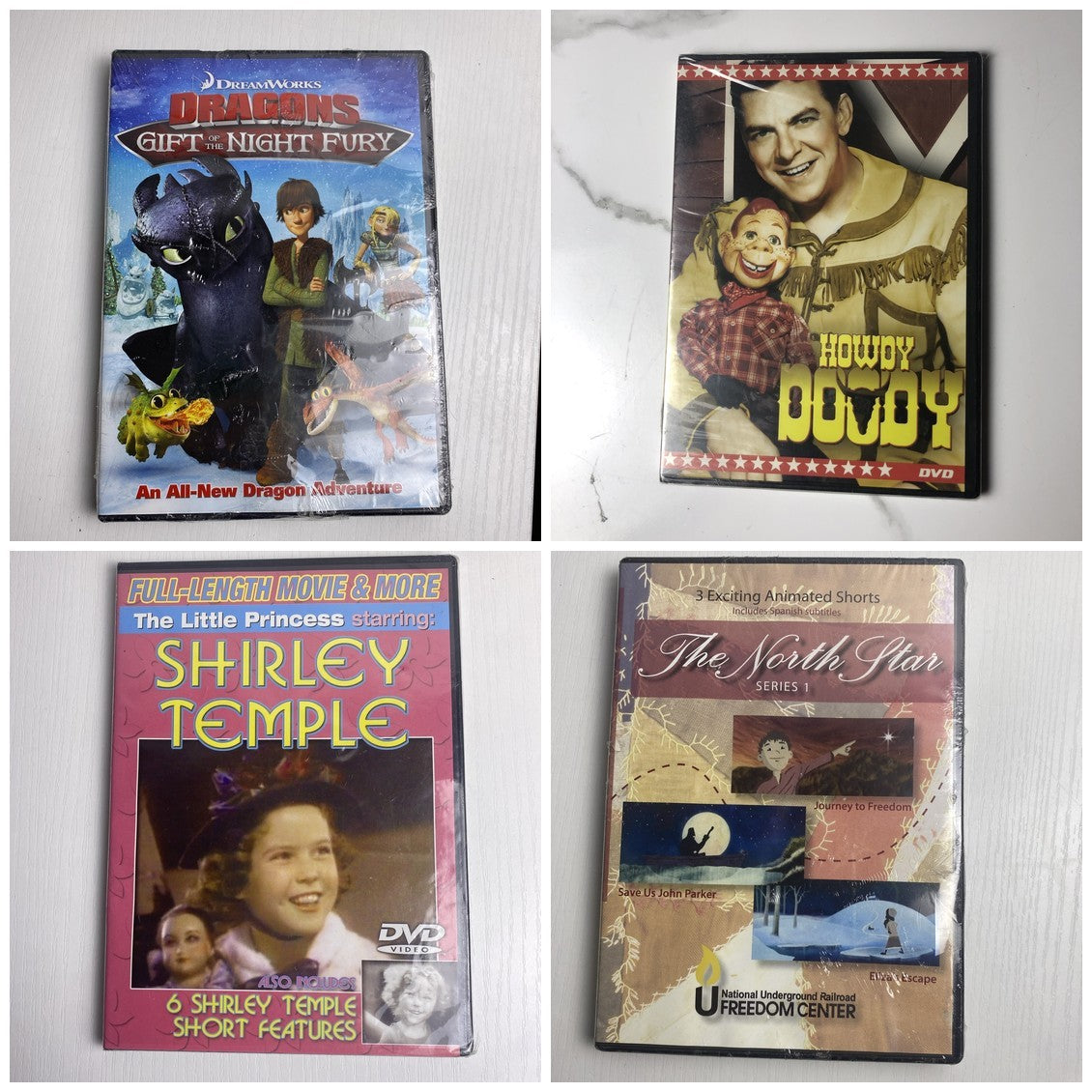 Set of 4 brand new factory sealed family DVDs including DreamWorks Dragons and Shirley Temple