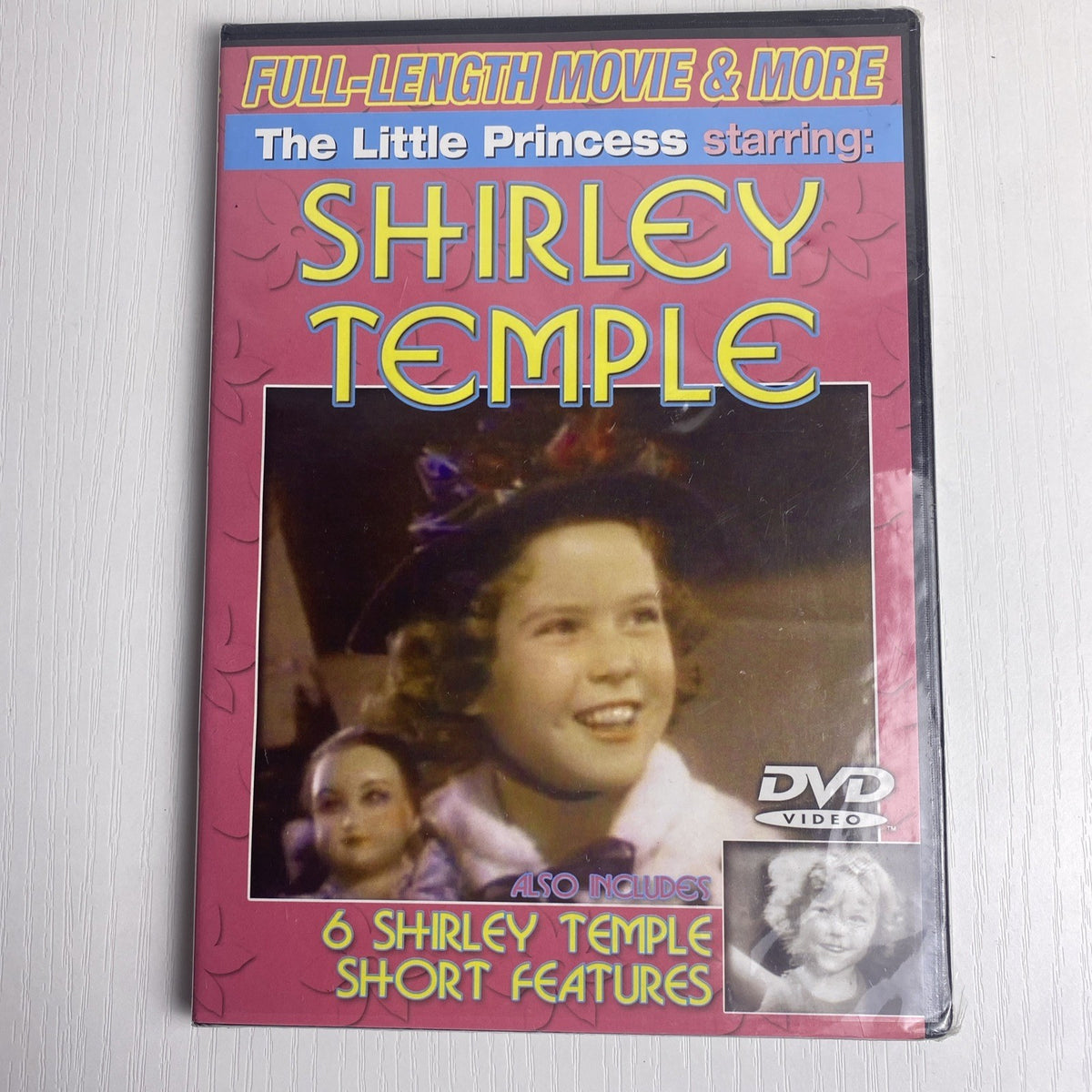 Set of 4 brand new factory sealed family DVDs including DreamWorks Dragons and Shirley Temple