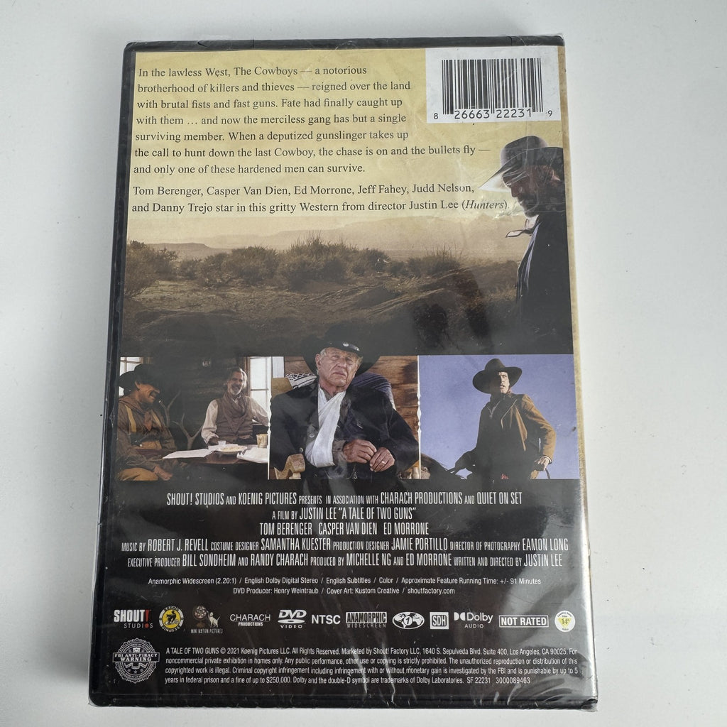 Four factory-sealed DVD movie cases including A Tale of Two Guns, American Teacher, AWOL, and A Piece of Eden.