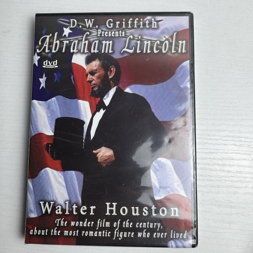 Set of four brand new factory sealed classic movie DVDs including About Schmidt and Abraham Lincoln.