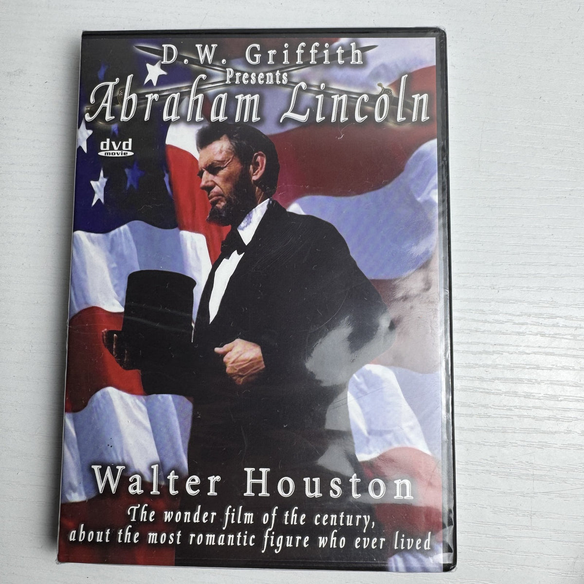Set of four brand new factory sealed classic movie DVDs including About Schmidt and Abraham Lincoln.