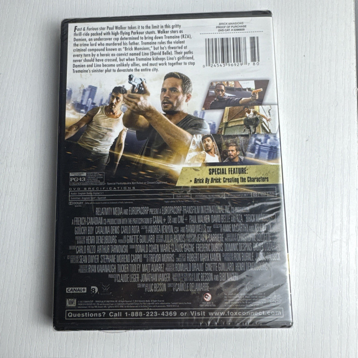 Factory-sealed lot of 4 brand new DVDs including Bobby, Brick Mansions, Bowling for Columbine, and Cirque Du Soleil.
