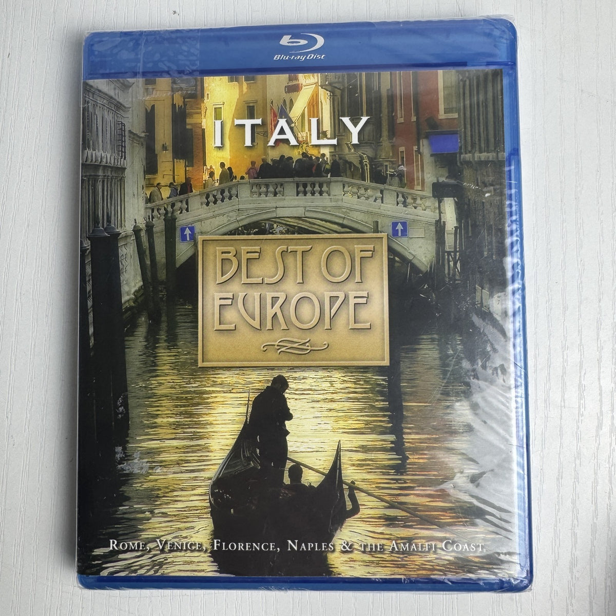 Lot of 4 brand new factory-sealed media titles including three DVDs and one Blu-ray disc in shrink wrap.