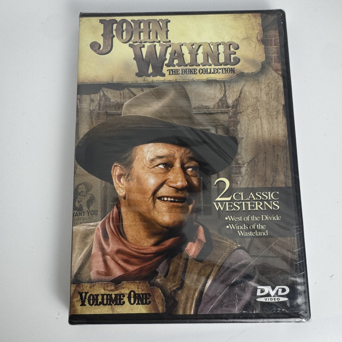 Four brand new sealed movie titles including John Wayne Western collections, Johnny Cash films, and Kingsman Blu-ray.