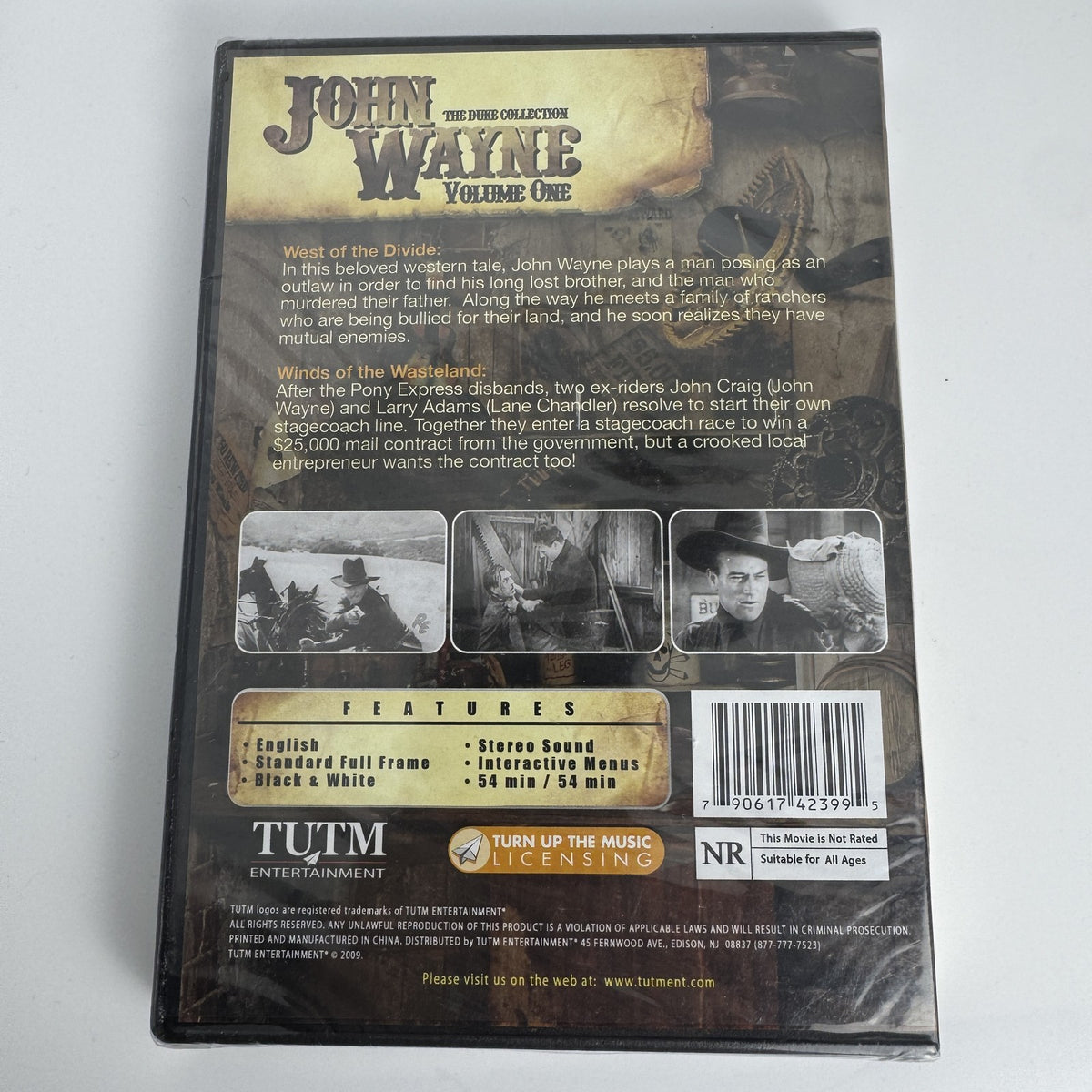 Four brand new sealed movie titles including John Wayne Western collections, Johnny Cash films, and Kingsman Blu-ray.