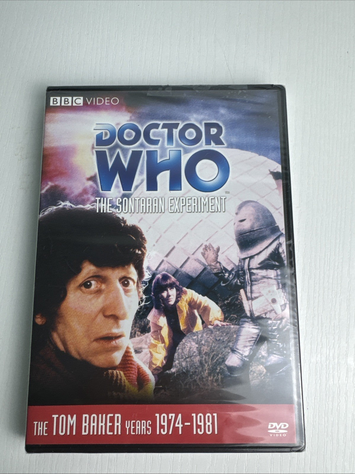Set of 4 brand new factory sealed DVDs including Doctor Who Tom Baker, Red Skelton, Nikon photography, and Enrico Caruso