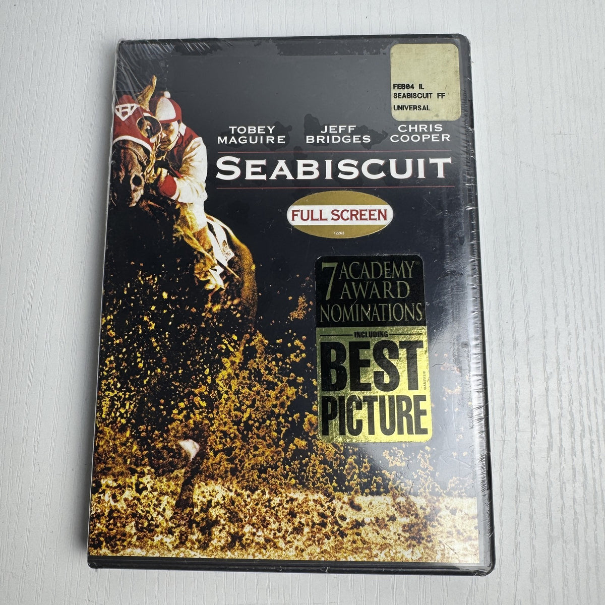 Set of 4 brand new factory sealed movie DVDs including Seabiscuit, Saint Ralph, Road, and Suze Orman.
