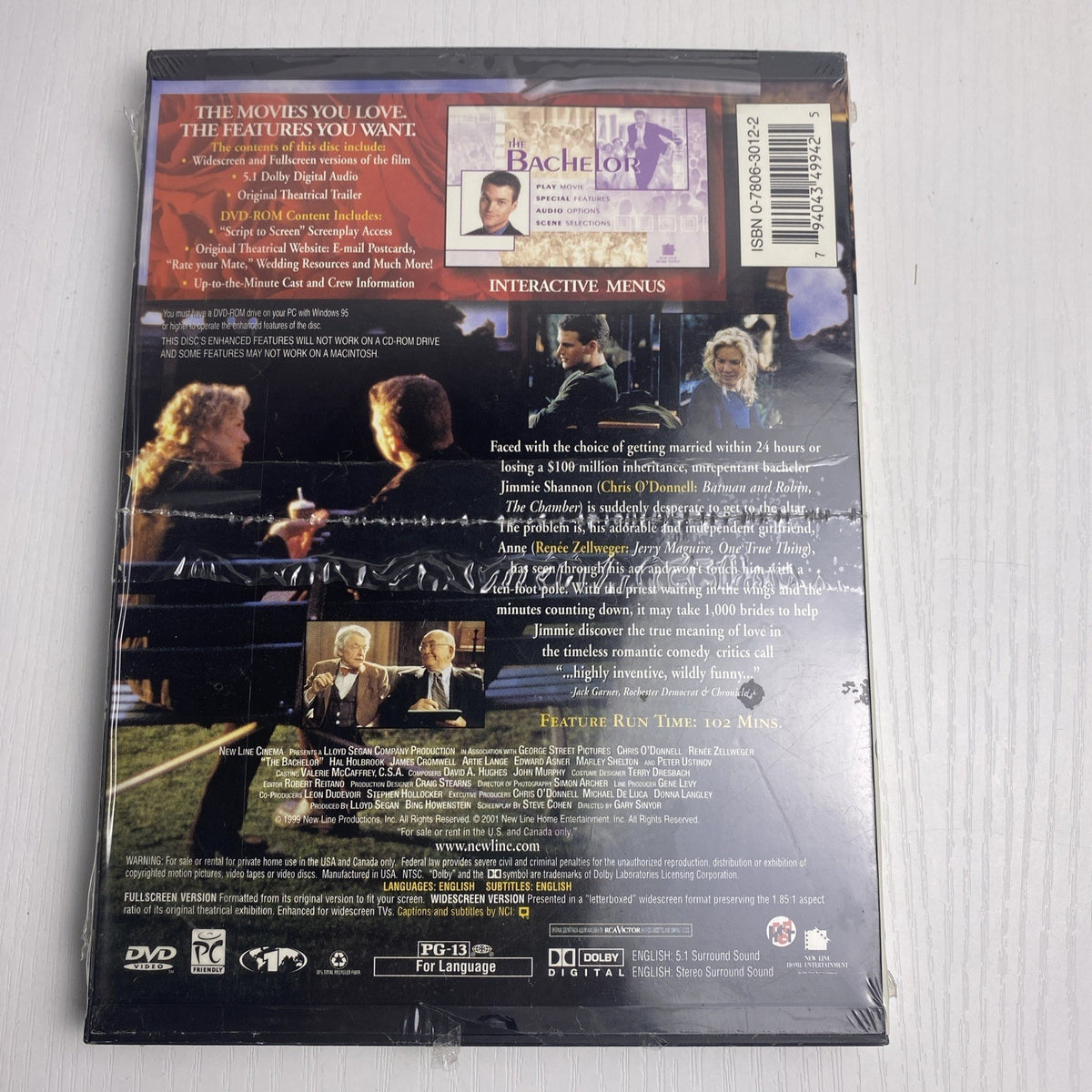 Brand new 3-DVD lot featuring factory-sealed copies of The Dark Knight, The Blind Side, and The Bachelor.