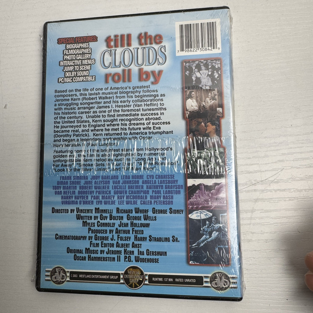 Set of 4 factory sealed brand new DVDs including Total Recall and Till the Clouds Roll By.