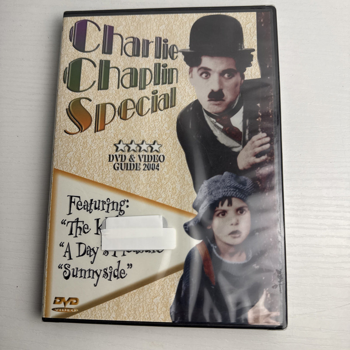 Lot of 4 brand-new factory-sealed DVDs featuring Under the Tuscan Sun, Vantage Point, and Charlie Chaplin.