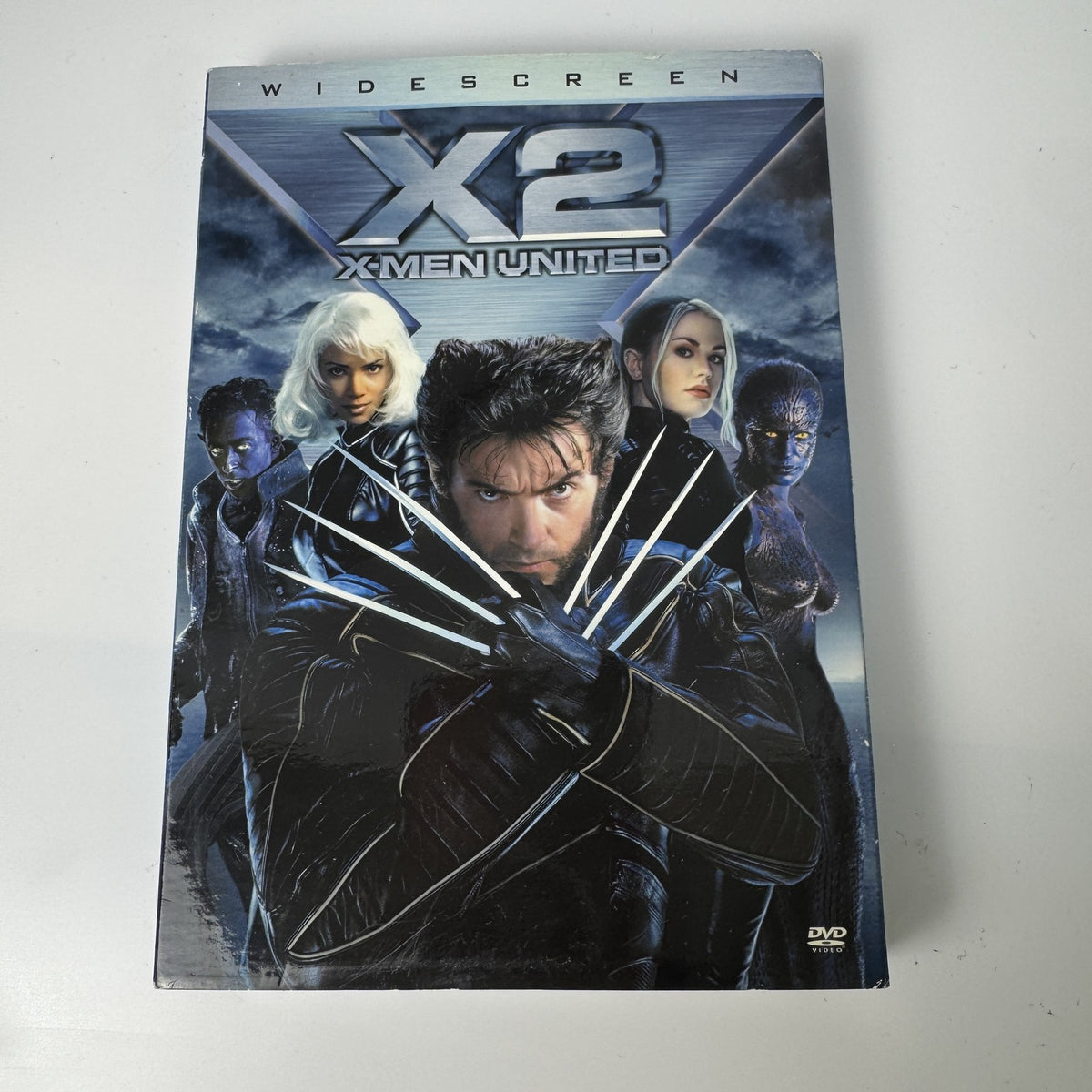 Brand new factory-sealed lot of 4 DVDs including X2 X-Men United, Scrooge, Christmas Child, and Á Đông Khói Lửa.