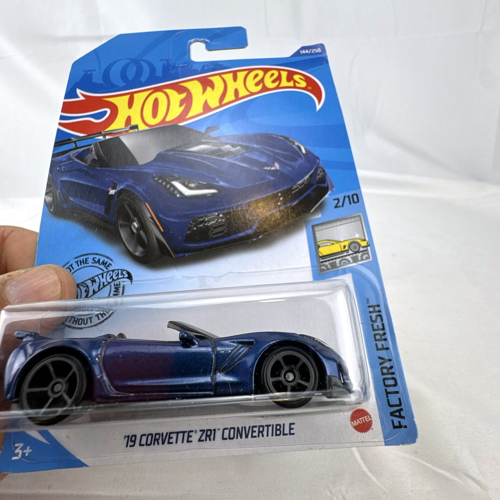 Set of 9 unopened Hot Wheels Factory Fresh 1:64 scale diecast sports cars including Porsche 911 GT3 and Corvette ZR1.