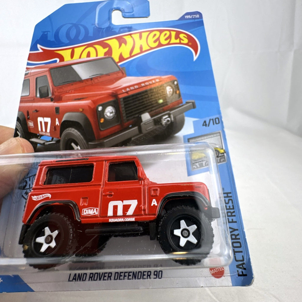 Hot Wheels Factory Fresh 1:64 6-car diecast lot including Nissan Z Proto, Volvo 850 Estate, Land Rover, and Lucid Air.