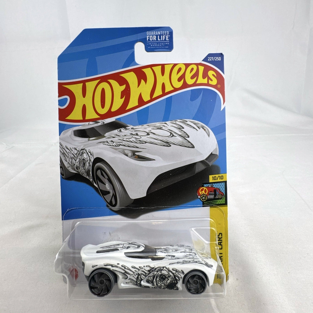 Hot Wheels HW Art Cars 9 diecast car lot including Raijin Express Humvee and 70s Van factory sealed on original cards