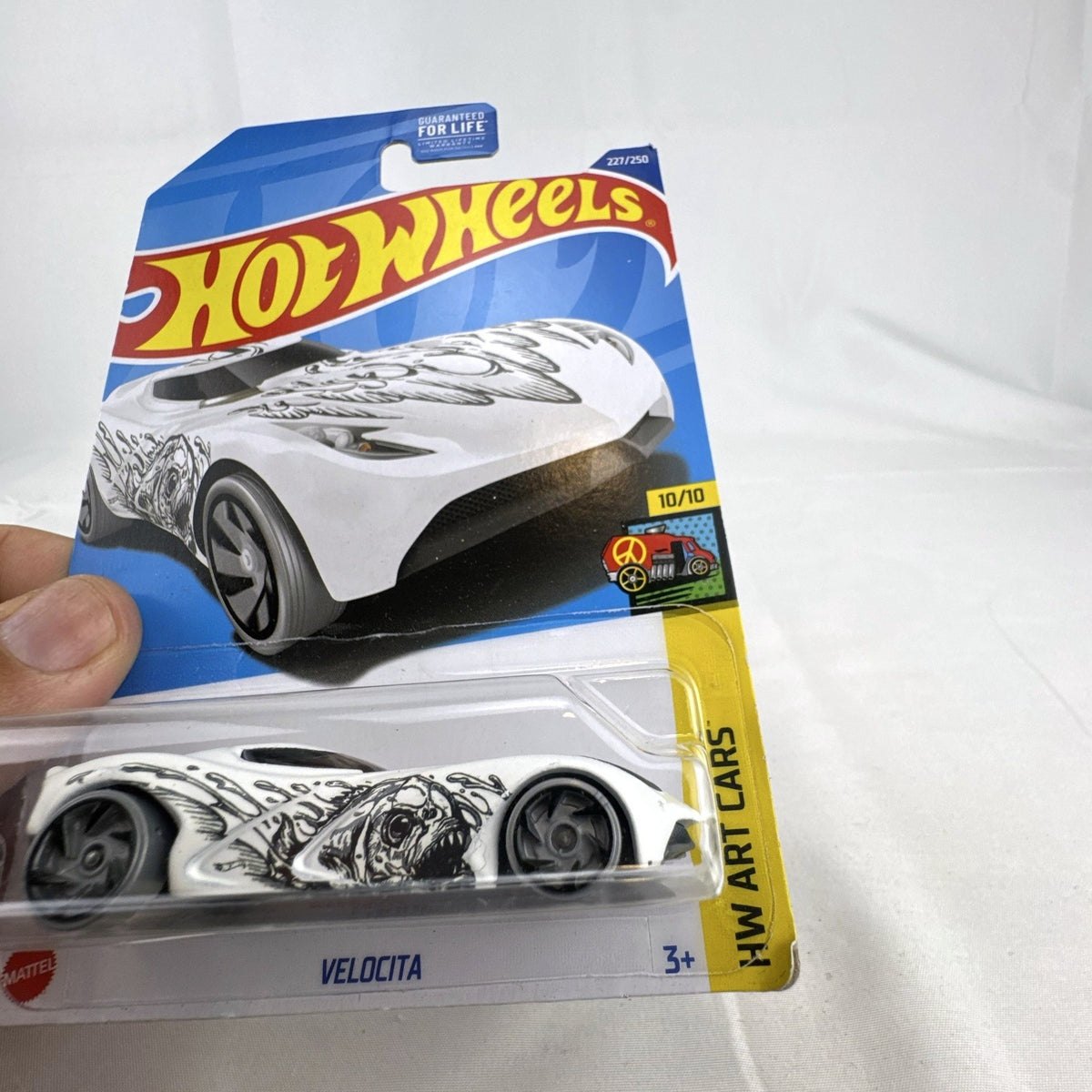 Hot Wheels HW Art Cars 9 diecast car lot including Raijin Express Humvee and 70s Van factory sealed on original cards