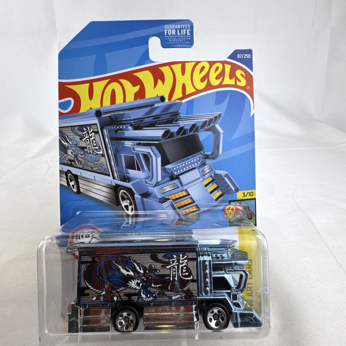 Hot Wheels HW Art Cars 9 diecast car lot including Raijin Express Humvee and 70s Van factory sealed on original cards