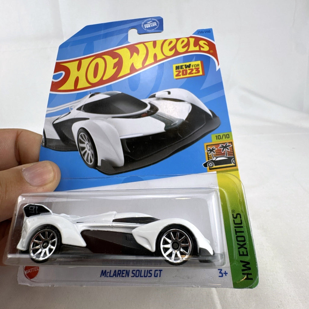 Hot Wheels HW Exotics 1:64 scale diecast 9-car hypercar lot including McLaren, Koenigsegg, and Pagani, factory sealed on card.
