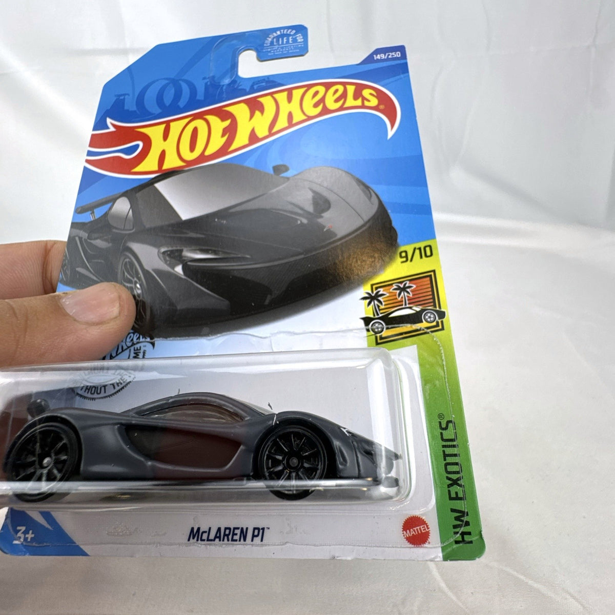 Hot Wheels HW Exotics 1:64 scale diecast 9-car hypercar lot including McLaren, Koenigsegg, and Pagani, factory sealed on card.