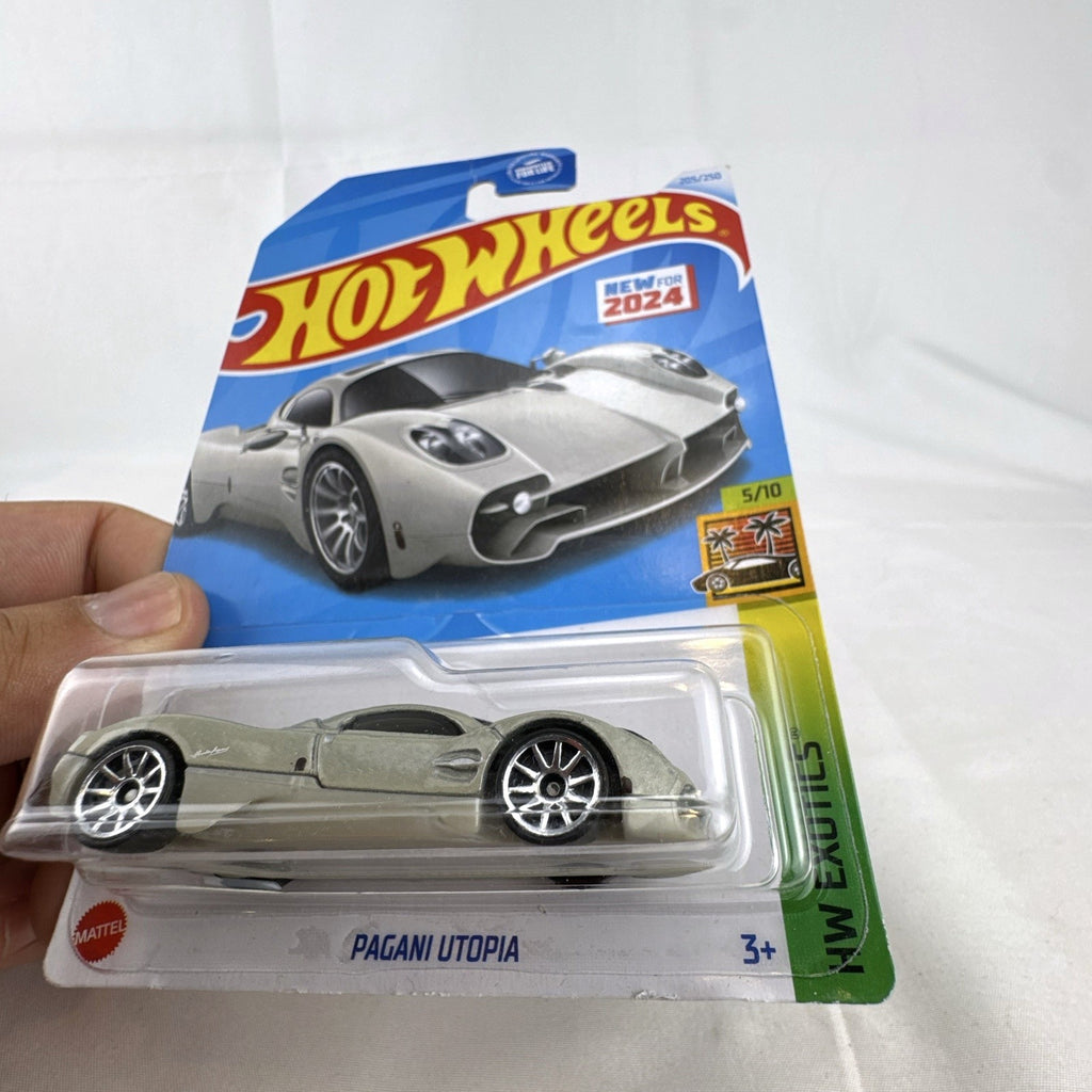 Hot Wheels HW Exotics 1:64 scale diecast 9-car hypercar lot including McLaren, Koenigsegg, and Pagani, factory sealed on card.