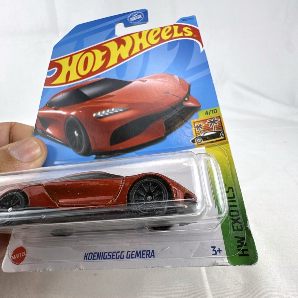 Hot Wheels HW Exotics 1:64 scale diecast 9-car hypercar lot including McLaren, Koenigsegg, and Pagani, factory sealed on card.