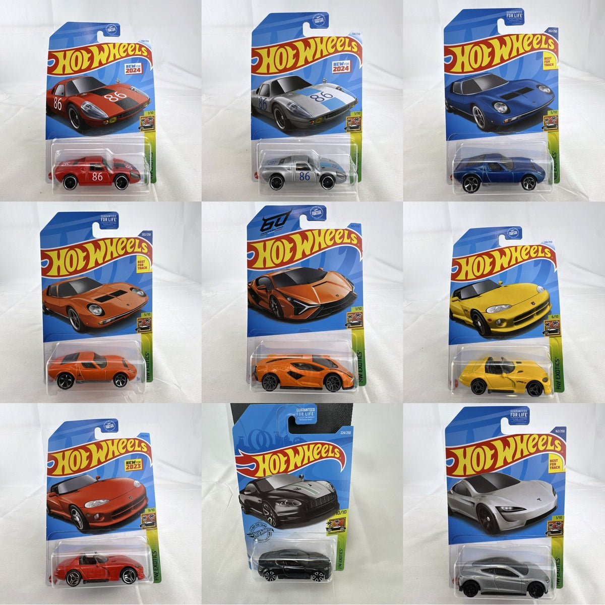 Nine factory sealed Hot Wheels HW Exotics 1:64 scale diecast cars including Porsche, Lamborghini, and Dodge Viper.