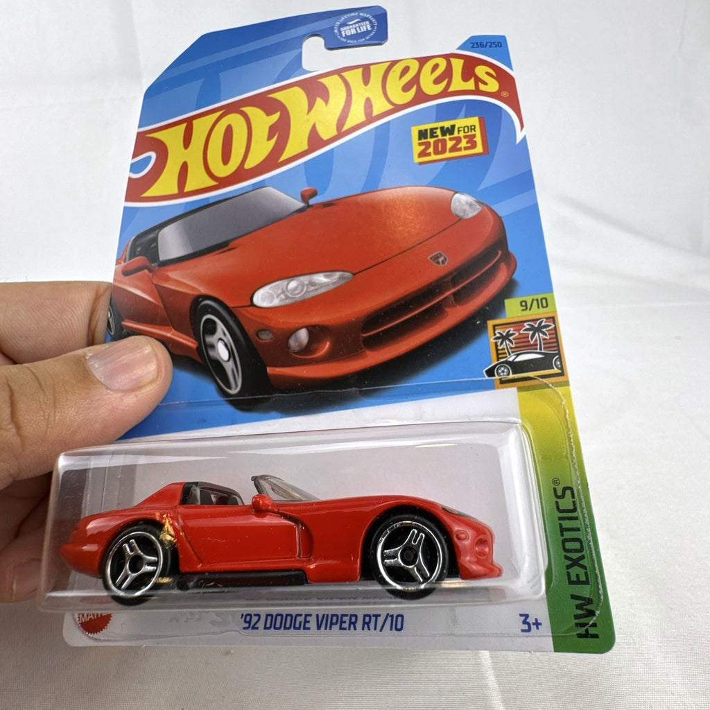 Nine factory sealed Hot Wheels HW Exotics 1:64 scale diecast cars including Porsche, Lamborghini, and Dodge Viper.