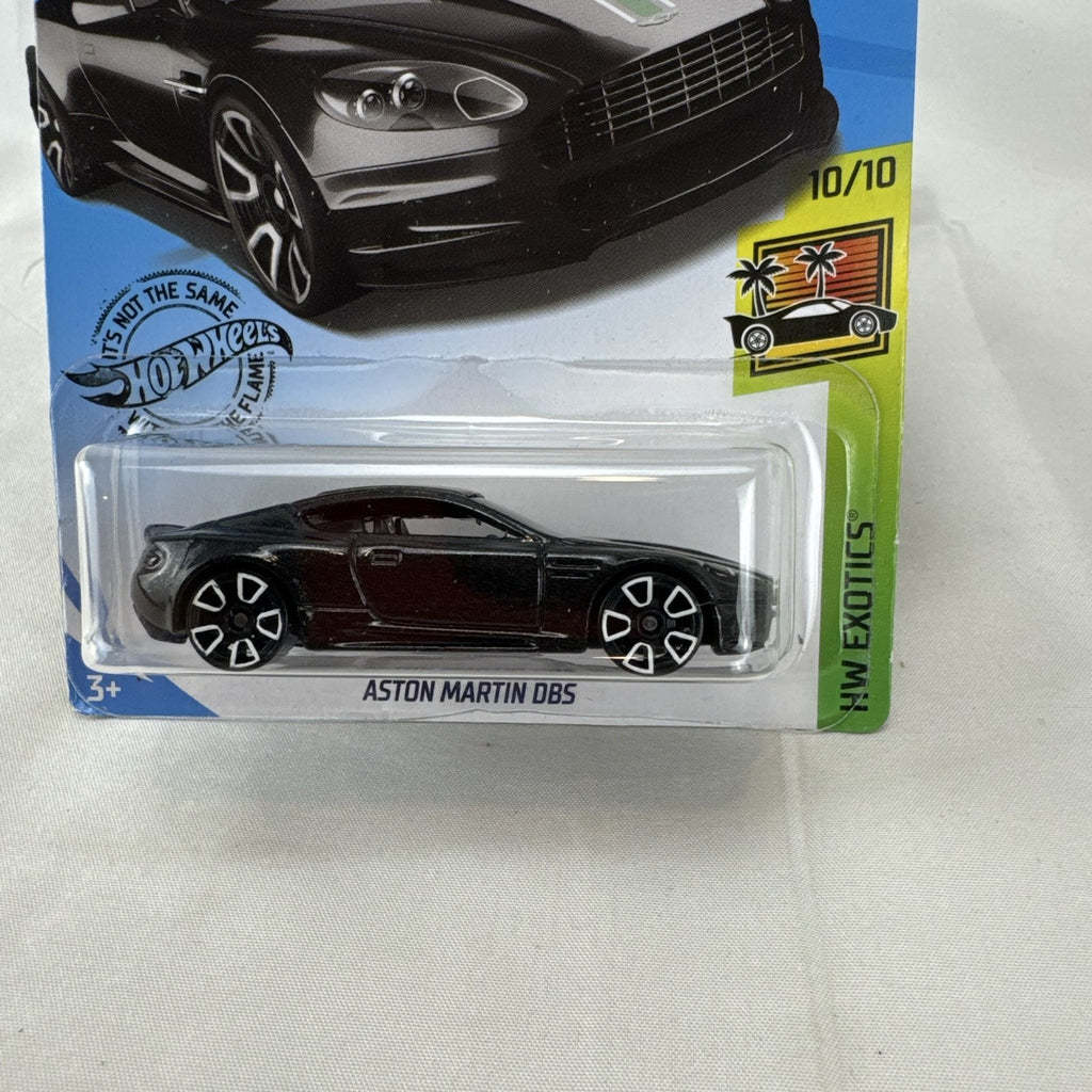 Nine factory sealed Hot Wheels HW Exotics 1:64 scale diecast cars including Porsche, Lamborghini, and Dodge Viper.