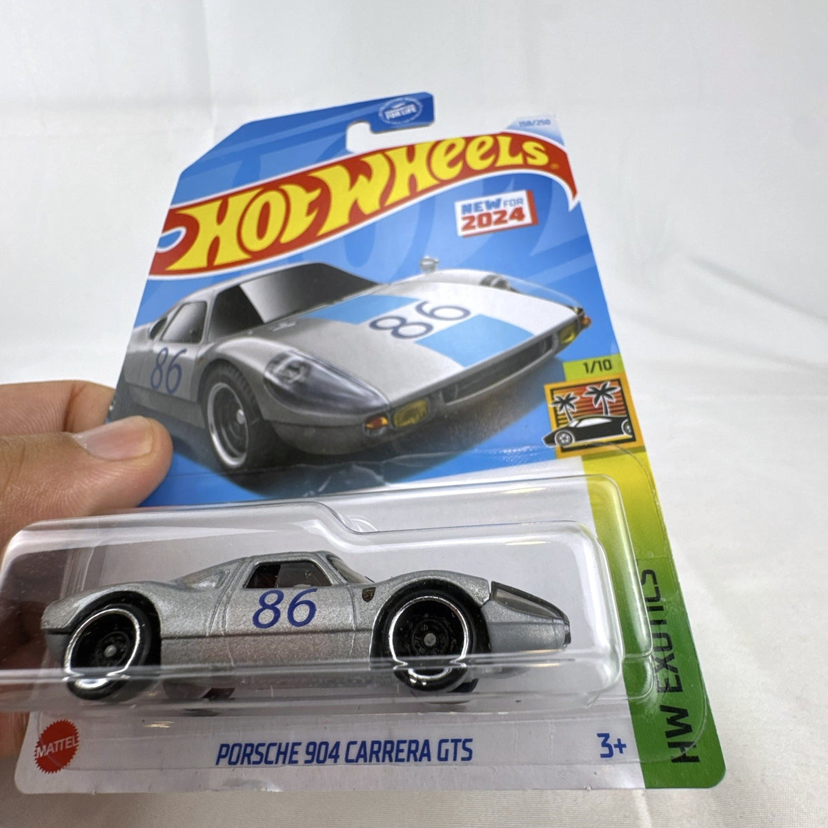 Nine factory sealed Hot Wheels HW Exotics 1:64 scale diecast cars including Porsche, Lamborghini, and Dodge Viper.
