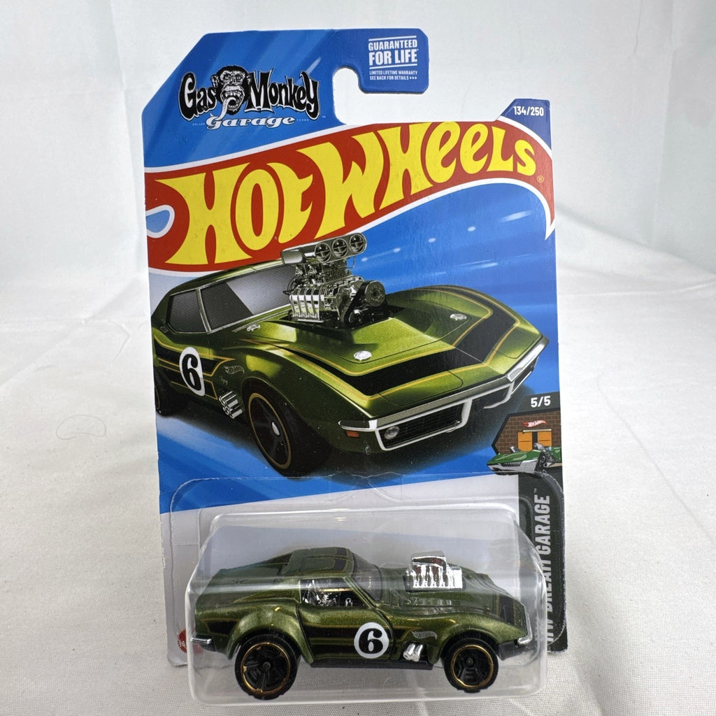 Hot Wheels HW Dream Garage 9-car diecast muscle car lot featuring Chevrolet and Ford models sealed on card.