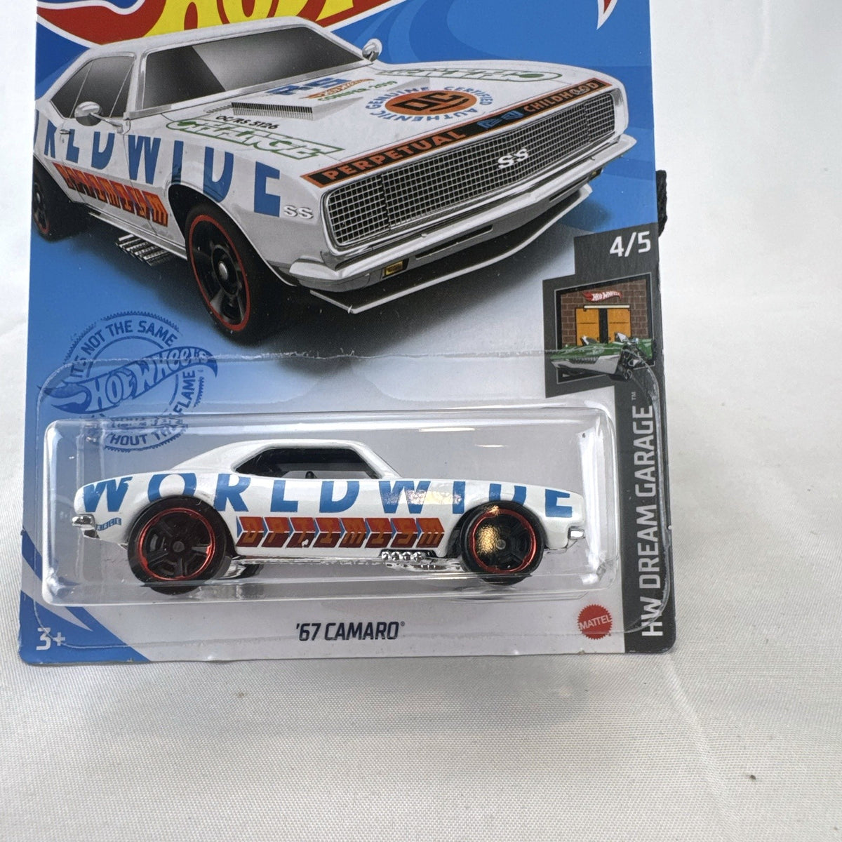 Hot Wheels HW Dream Garage 9-car diecast muscle car lot featuring Chevrolet and Ford models sealed on card.