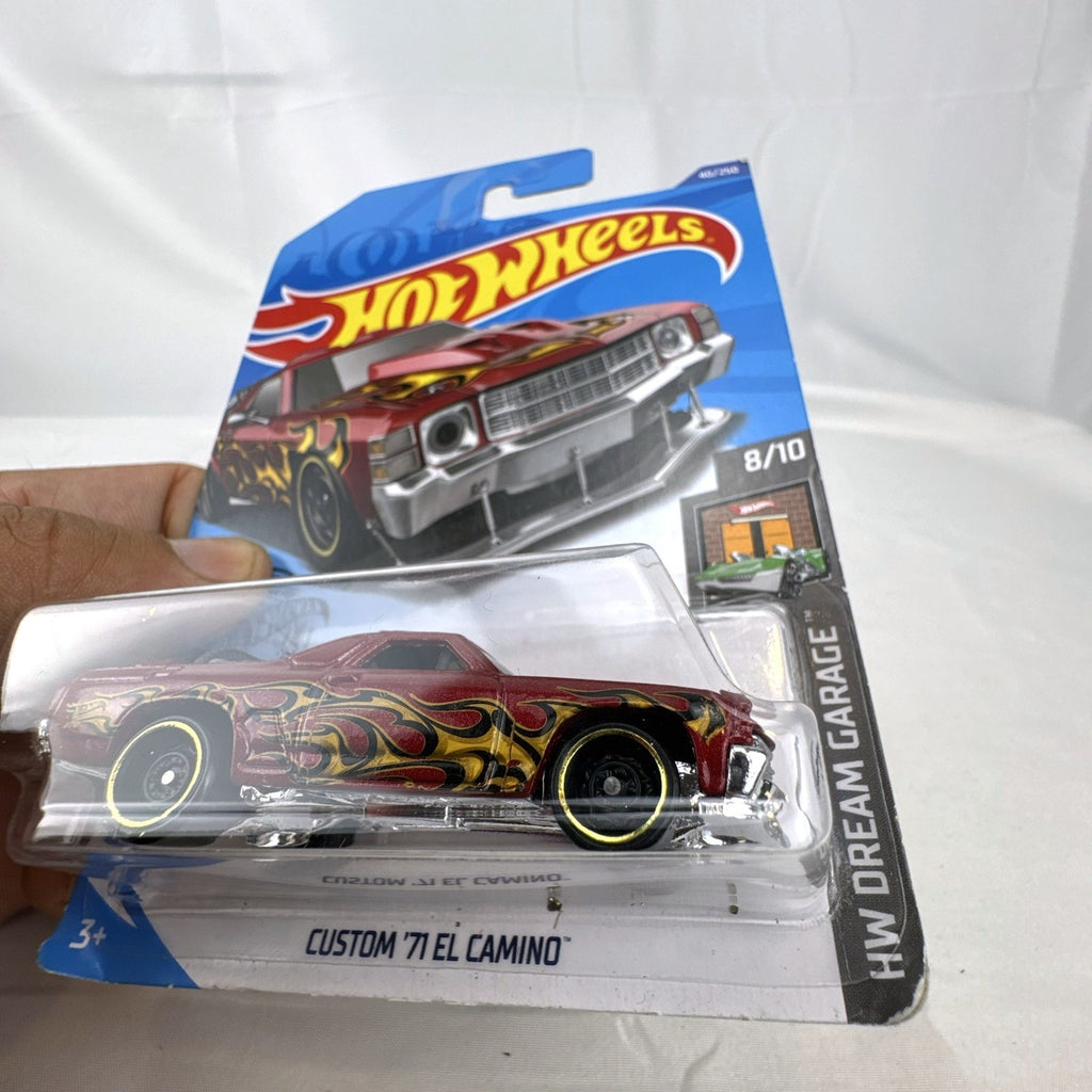 Hot Wheels HW Dream Garage 9-car diecast muscle car lot featuring Chevrolet and Ford models sealed on card.