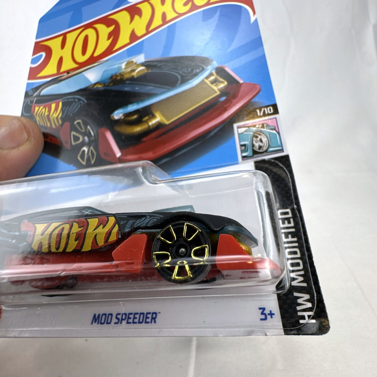 Hot Wheels HW Modified series 1:64 scale diecast 8-car lot featuring custom tuner trucks and widebody muscle cars