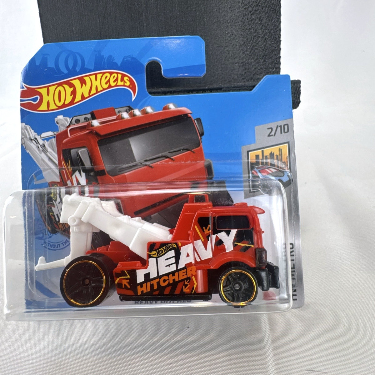 Hot Wheels HW Metro 11-car diecast set featuring 1:64 scale commercial and utility vehicles sealed on original cards.