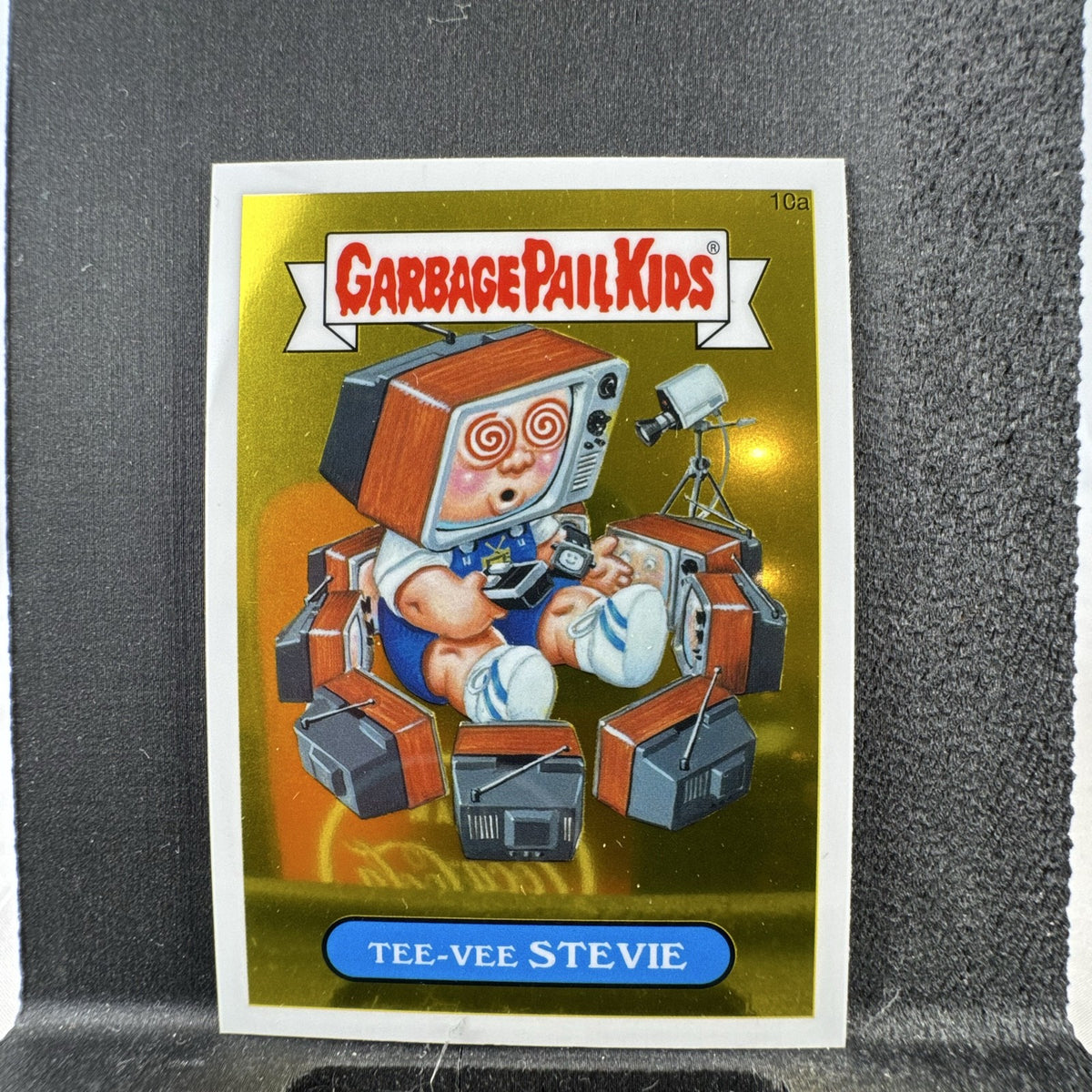 Topps 2013 Garbage Pail Kids Chrome Series 1 Tee-Vee Stevie 10a metallic sticker trading card