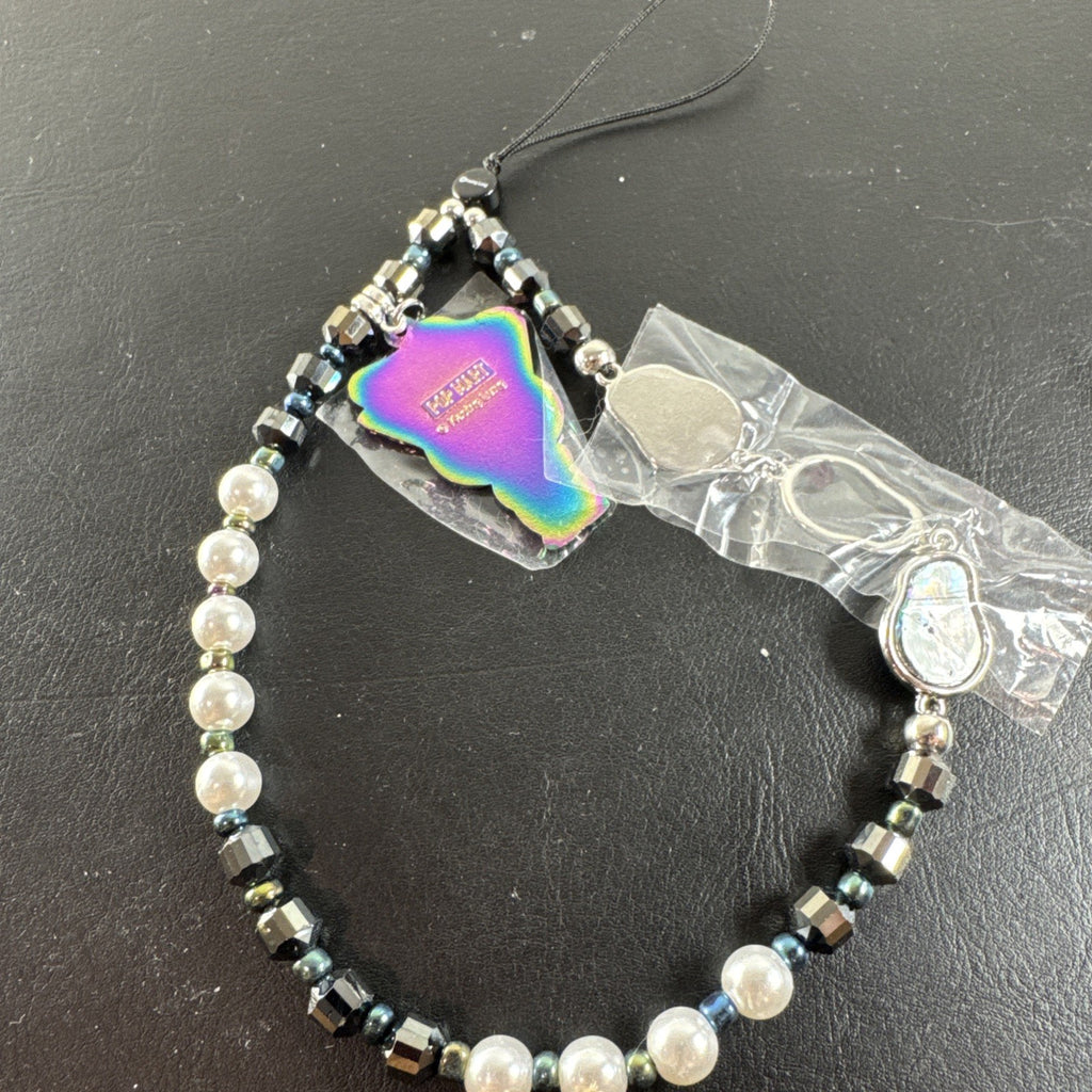 Pop Mart Big Into Energy Secret phone charm action figure by Kasing Lung with iridescent accents