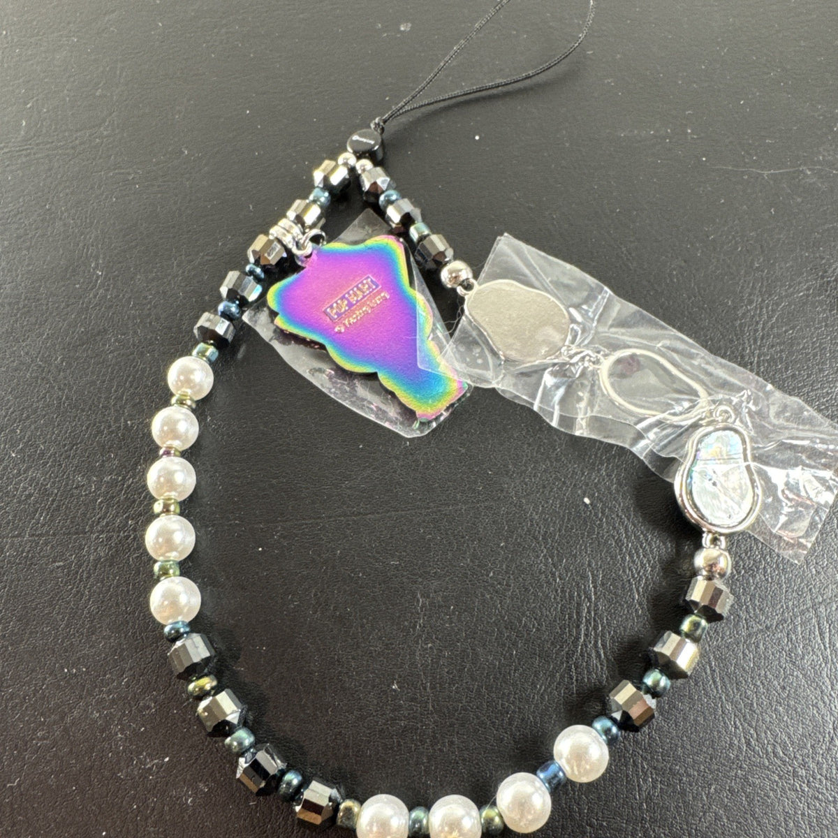 Pop Mart Big Into Energy Secret phone charm action figure by Kasing Lung with iridescent accents