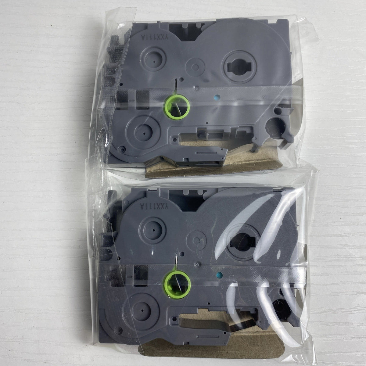 Brother P-Touch 12mm TZe laminated label tape cartridges in black on white, 2-pack sealed in package