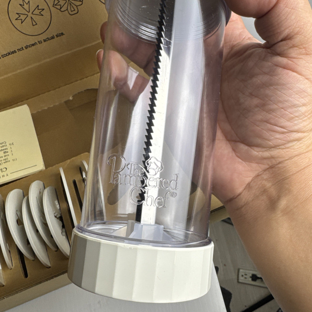 Pampered Chef model 1525 white cookie press with clear barrel and shaping discs in original box