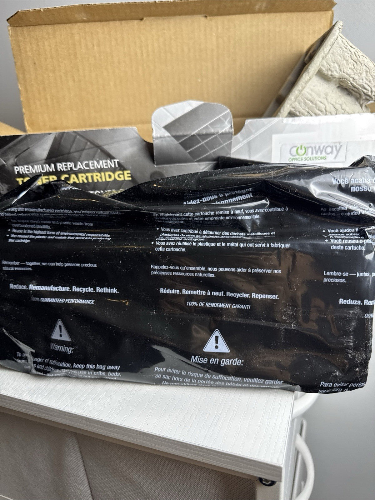 Generic replacement TN-570 black laser toner cartridge sealed in protective packaging.