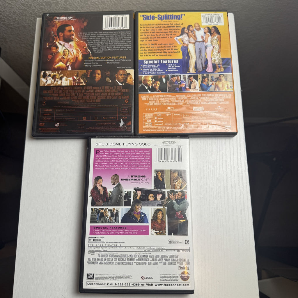 Three DVD cases featuring Baggage Claim, Deliver Us From Eva, and The Gospel romantic drama films.