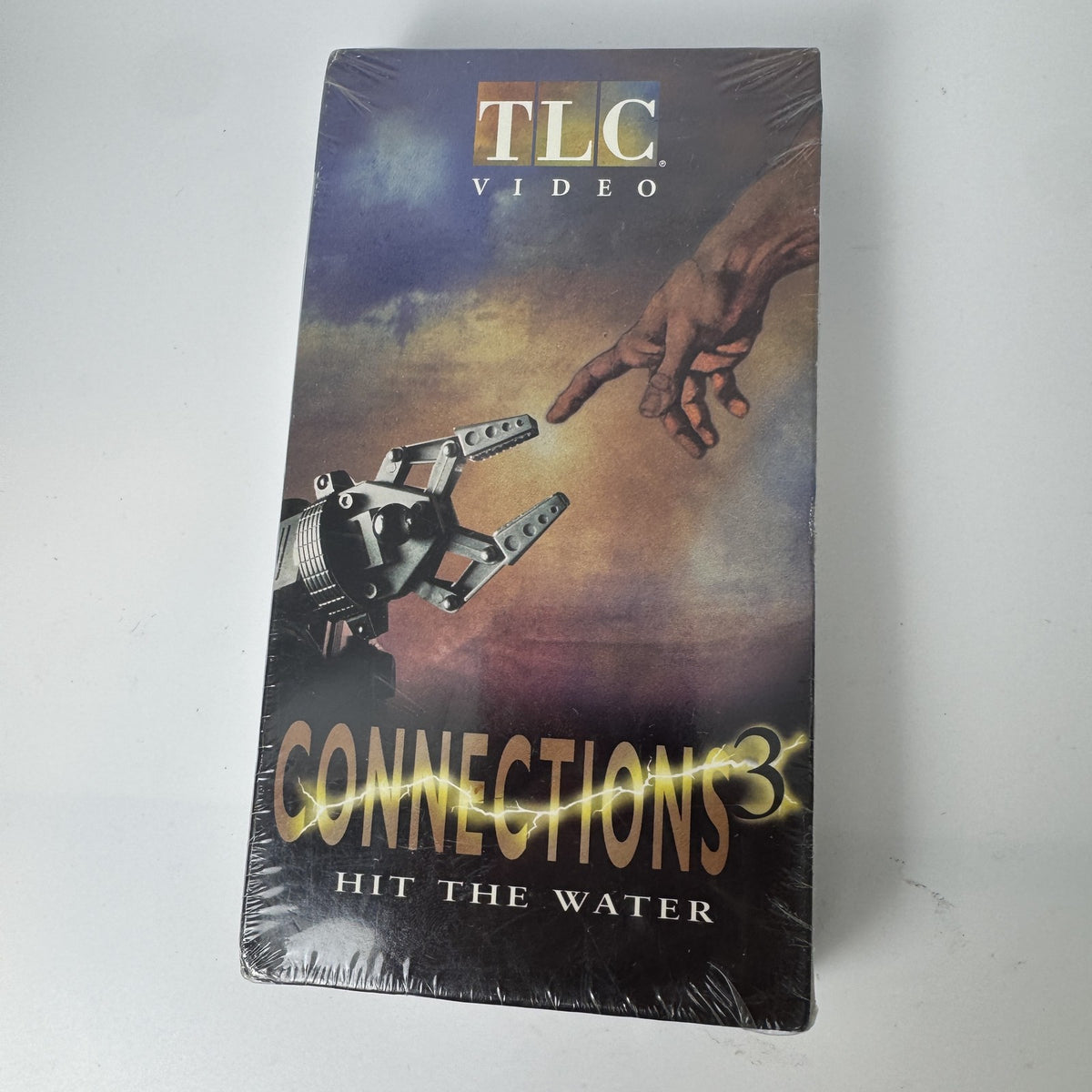 Factory sealed 1997 VHS tape of Connections 3 Hit The Water documentary series by TLC Video featuring James Burke.