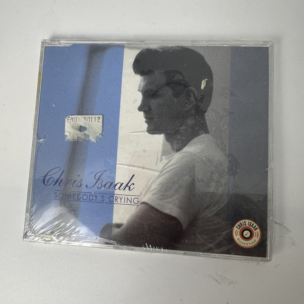 Front cover of Chris Isaak Somebody's Crying 1995 Silvertone CD single in original factory sealed shrink wrap.