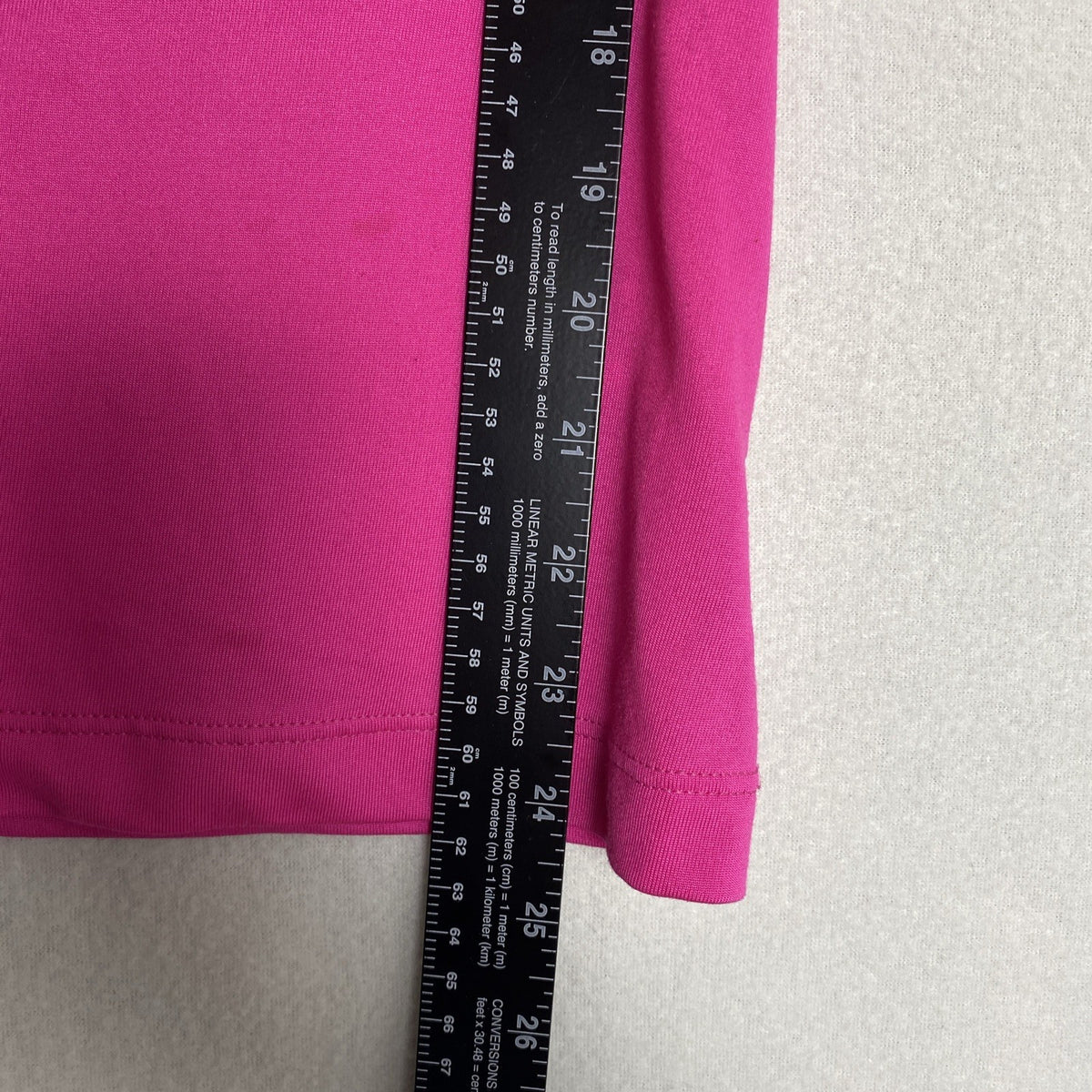 Reebok women's pink and black PlayDry racerback tank top with breast cancer ribbon graphic in size Medium.