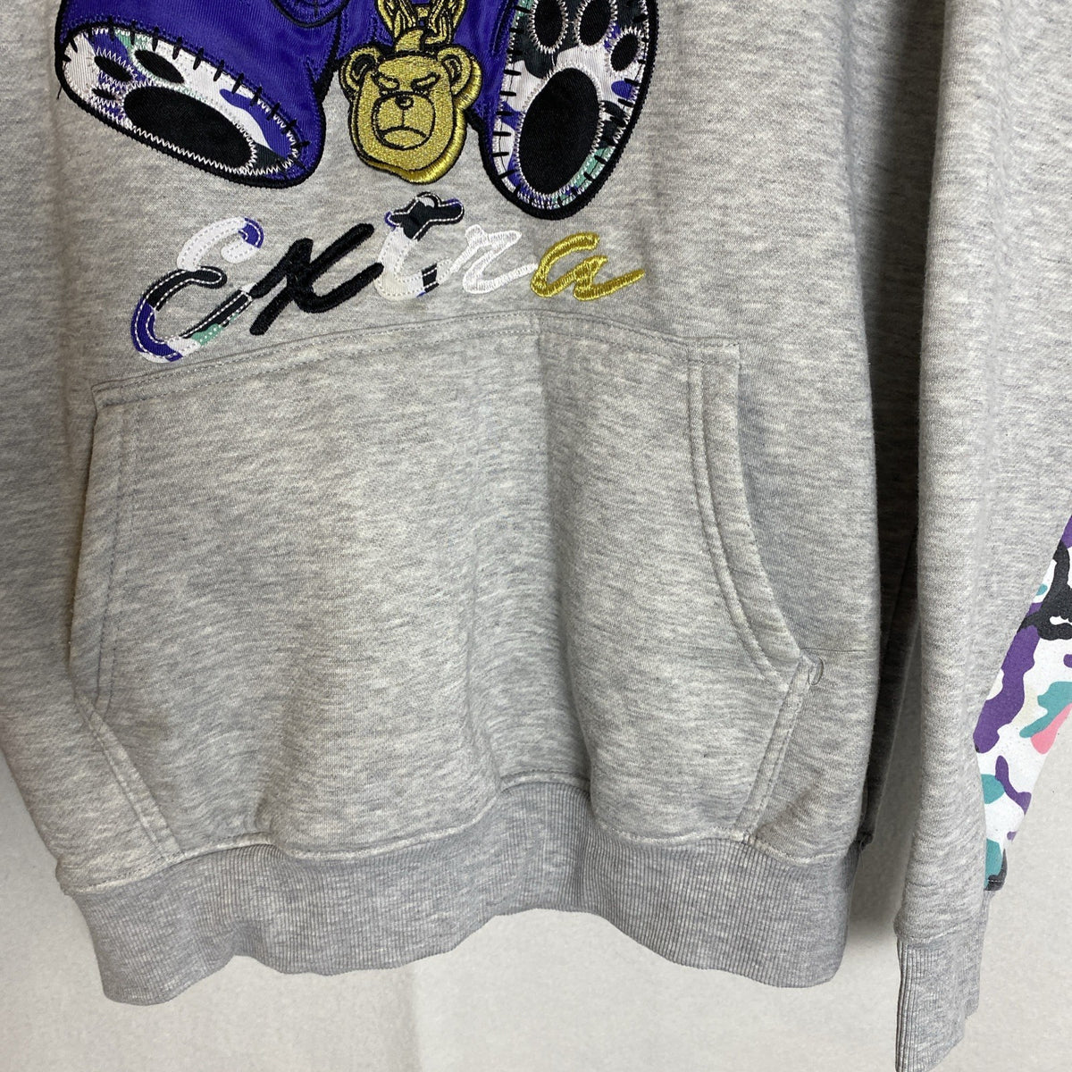 Screenshot Extra Bear men's pullover hoodie in heather gray with embroidered graphic and camo sleeve accents