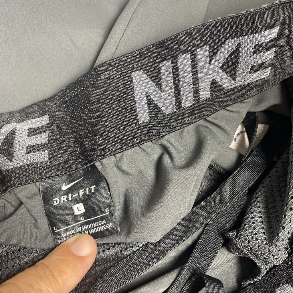 Black Nike Soldiers basketball Dri-FIT athletic woven shorts in men's size Large.