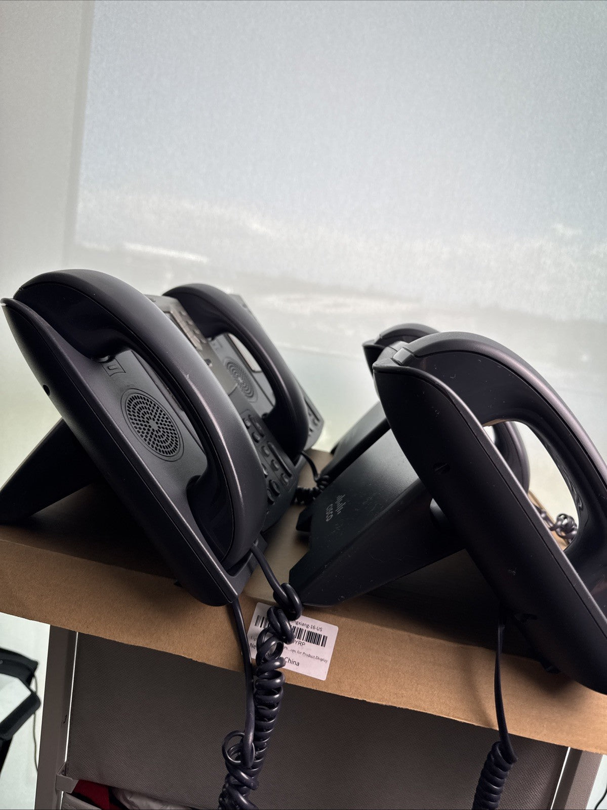 Lot of 4 unlocked Cisco SPA504G 4-line IP phones with handsets and desktop stands