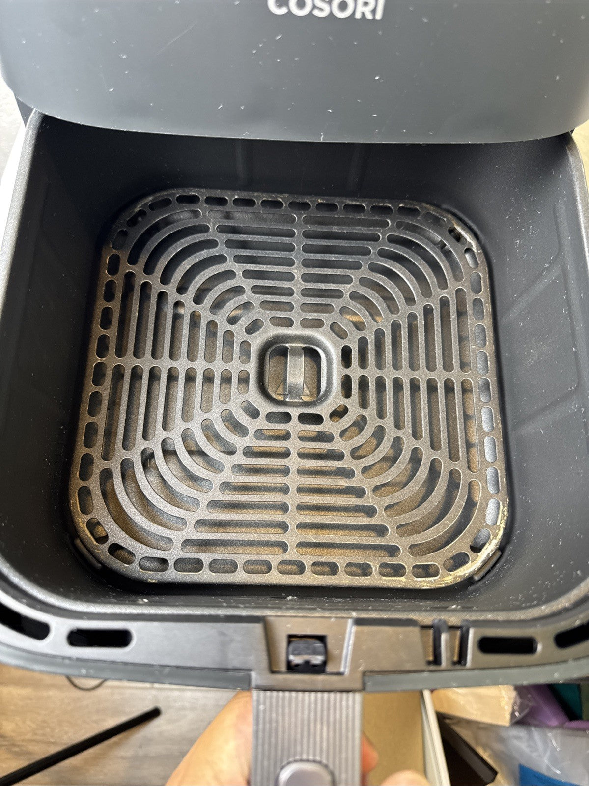 Black Cosori TurboBlaze 6-quart air fryer showing top control panel and front basket