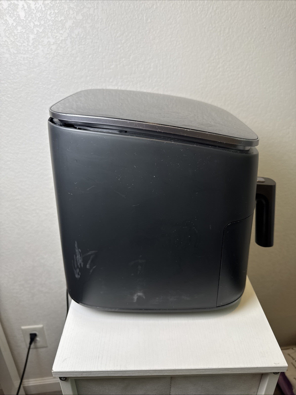 Black Cosori TurboBlaze 6-quart air fryer showing top control panel and front basket